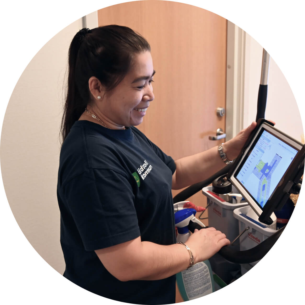 a woman is looking at a tablet